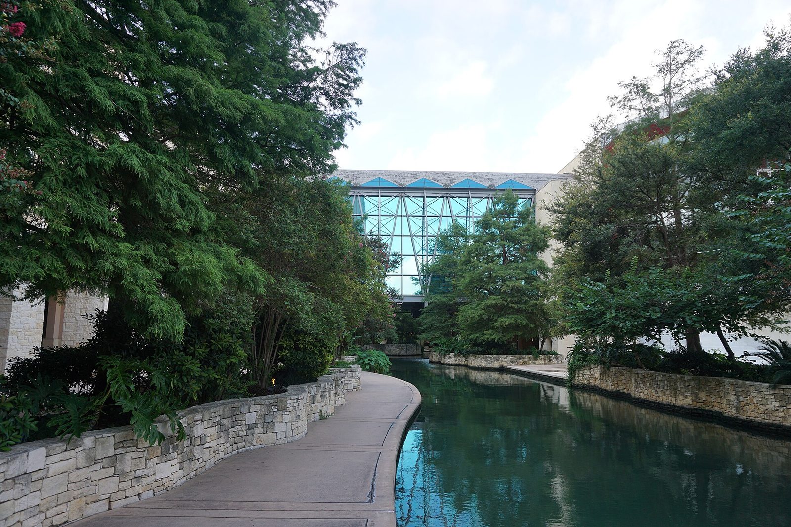 The River Walk path running beside the Henry B. Gonzalez Convention Center, next door to the hotel