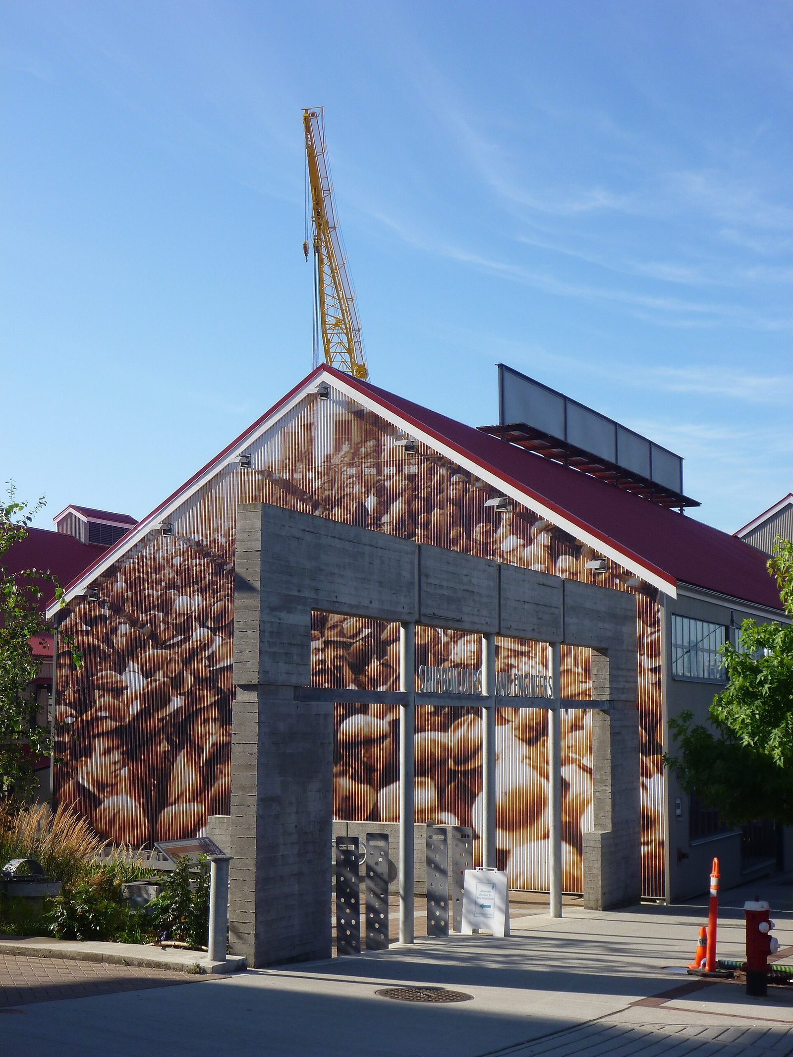 The Shipbuilders and Engineers gateway at the entrance to the Shipyards precinct, North Vancouver, next to the hotel (surrounding area, not the hotel itself).