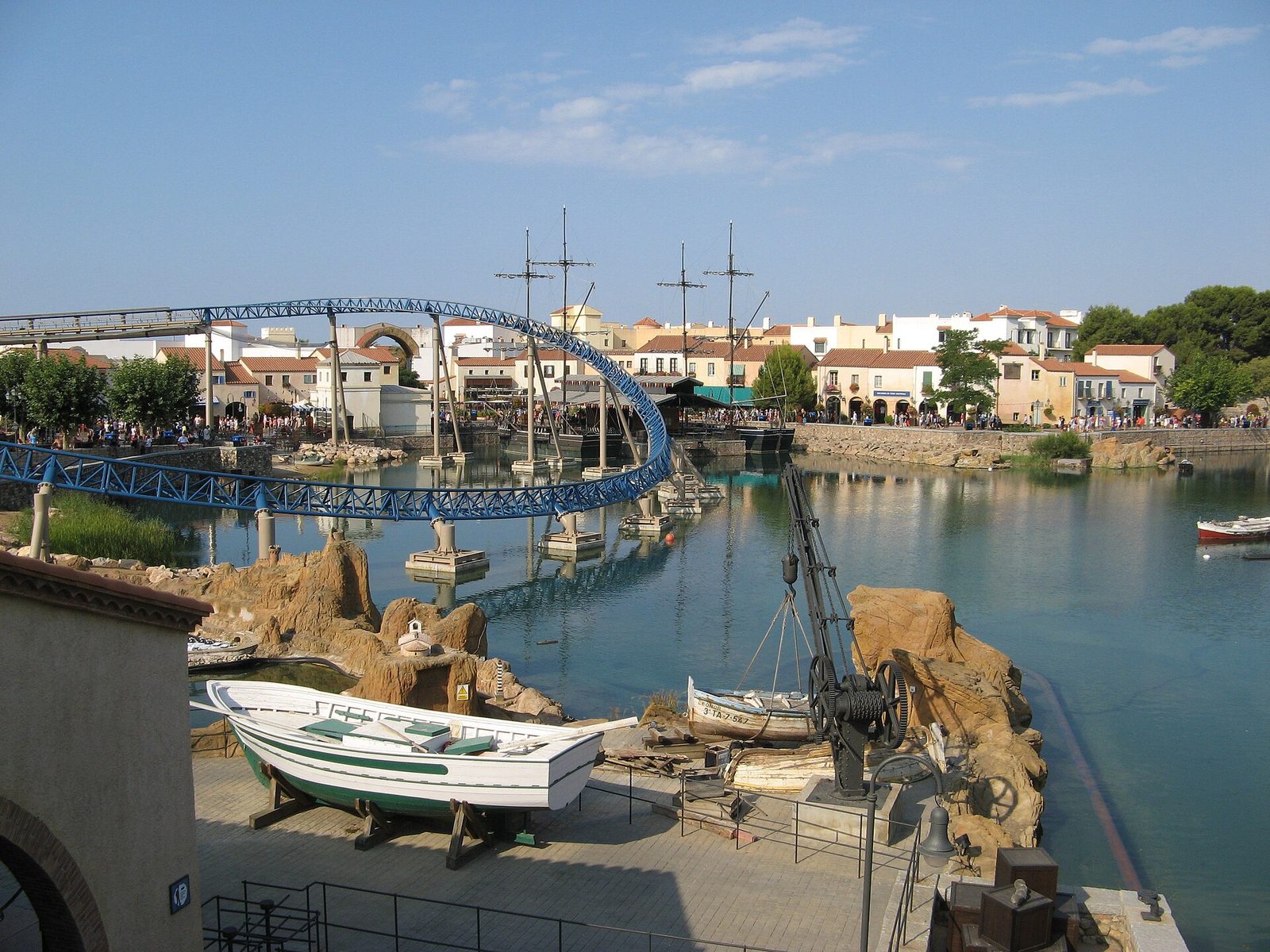 The Mediterrània lake inside PortAventura Park with the Furius Baco ride behind, part of the resort around the convention centre (not the convention centre itself)